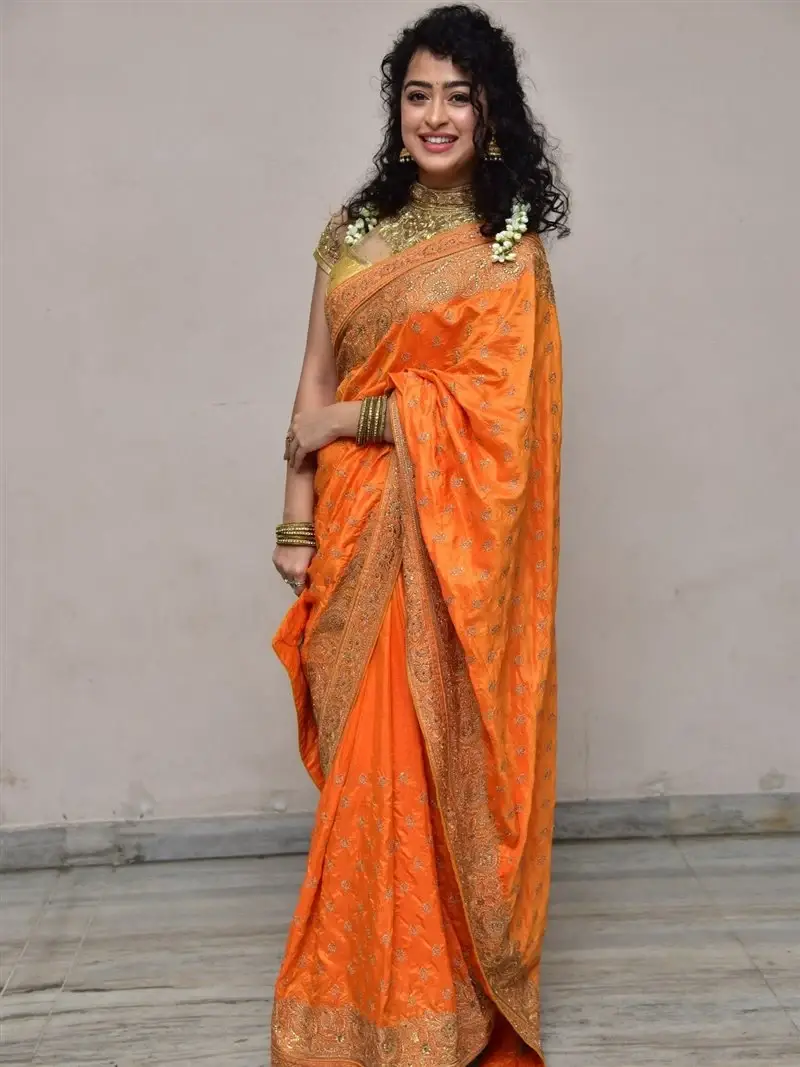 Actress Apsara Rani in Orange Saree at Talakona Movie Launch